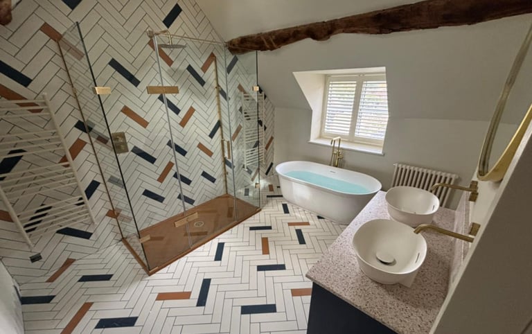 a bathroom with a tub and a shower installed by PBP Services in Evesham