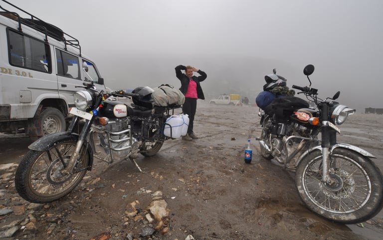 Tracey Billington riding the Leh to Manali highway over the great Himalayan range, Ladakh, India 