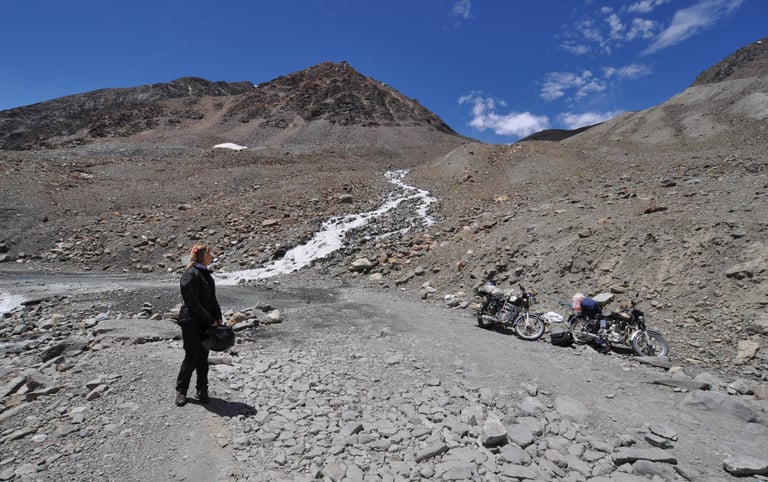 Tracey Billington riding the Leh to Manali highway over the great Himalayan range, Ladakh, India 