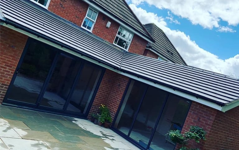 Builders in Pershore constructing rear kitchen extension with skylights