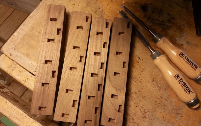 small wooden mortises custom joinery with wood chisels