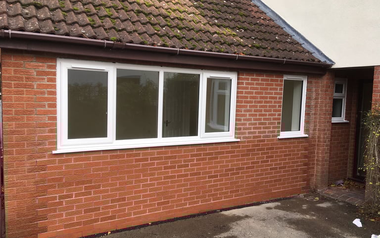 outside brick work on a garage conversion carried out by lakes building and plastering services