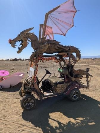 a dragonfly buggy with a dragonfly on it