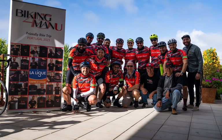 a group of people standing around a bike