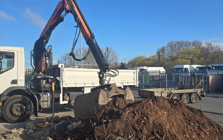 Commercial muck-away grab lorry on site in Stourbridge and Wollaston