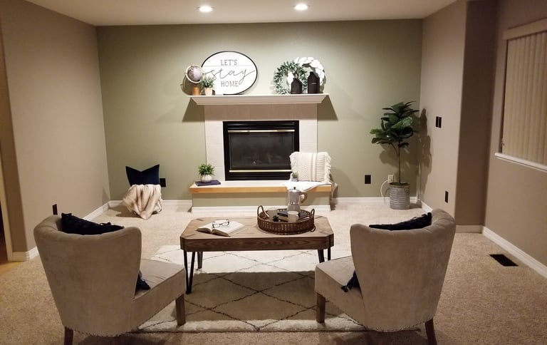 a living room with a fireplace