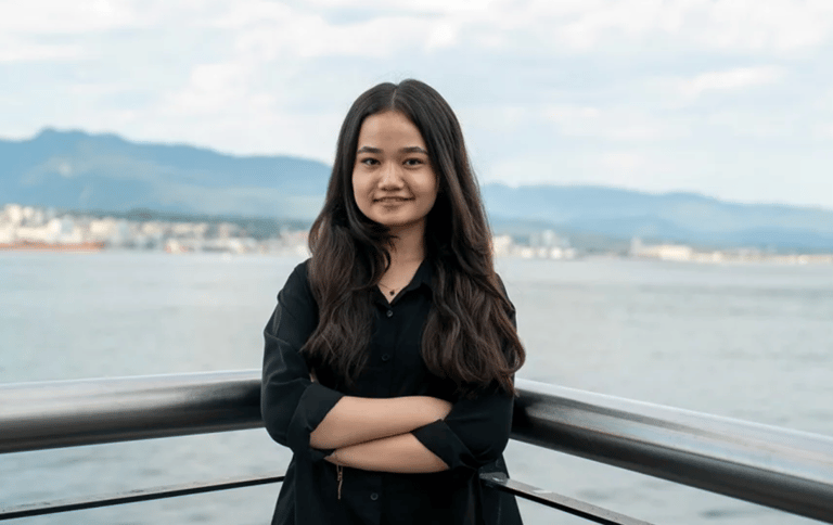 Nila Ibrahimi, International Children's Peace Prize Winner, standing in Vancouver.
