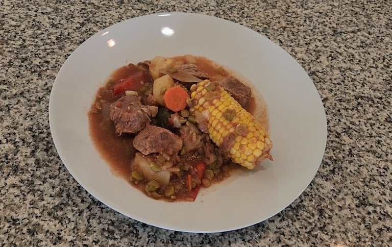 a plate on a counter with casserole meat