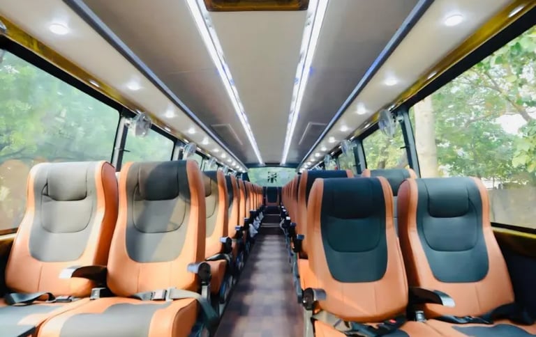 53 seater luxury bus interior with wide aisle seating in Delhi