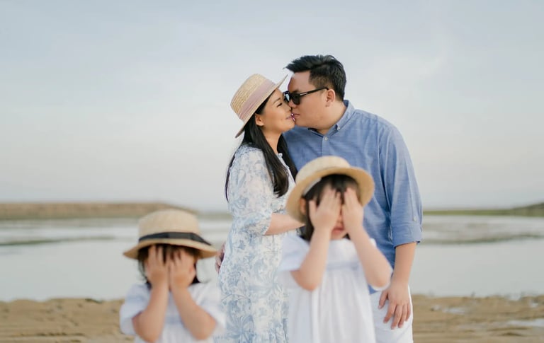 Candid family moments on the beach at The Apurva Kempinski Bali during golden hour