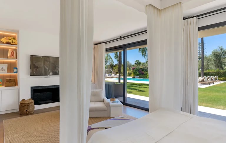 suite with terrace access and pool views at Villa El Olivo, Marbella