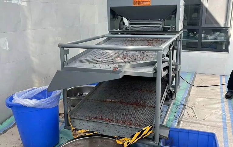a machine that is screening pepper impuritiesin a factory