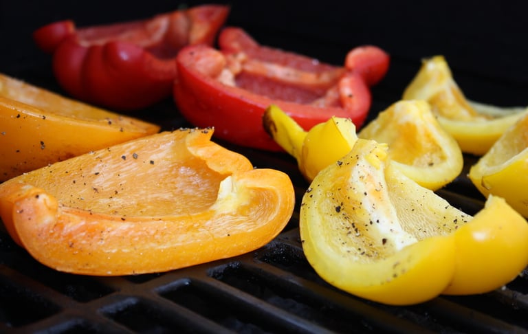 bell peppers grilling on barbecue