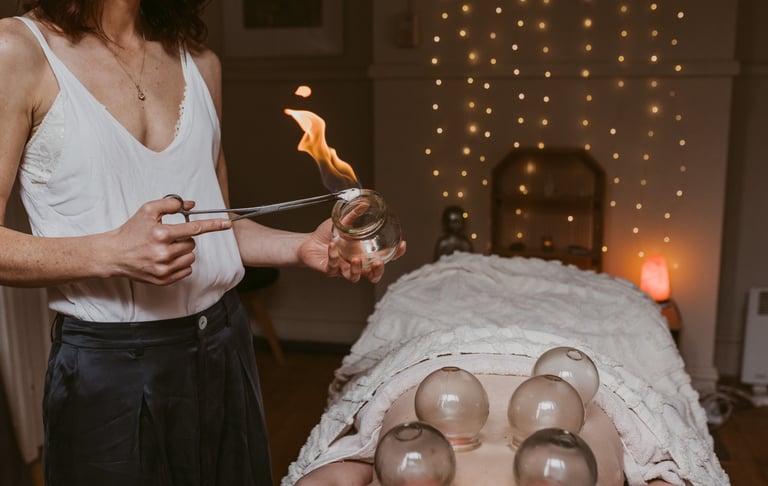 a woman is shown in a photo using flame to set up cupping