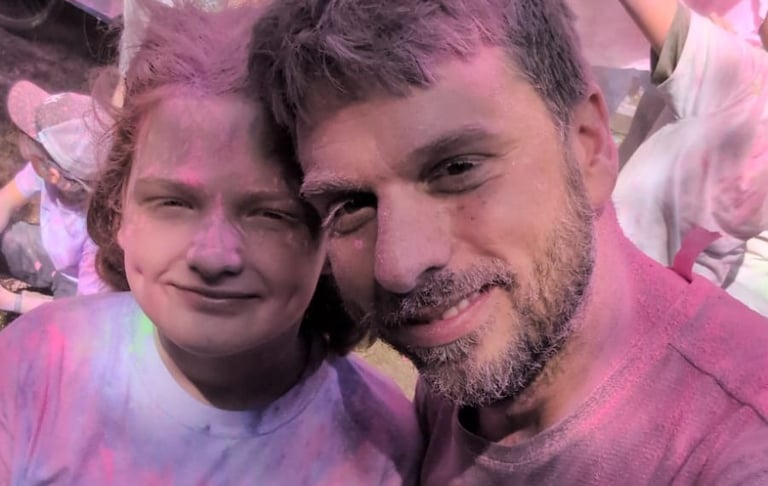 A leader and a scout from the 25th Allerton covered in powder paint