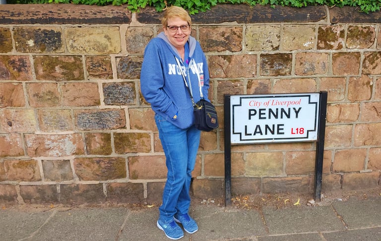 Lady on Penny Lane in Liverpool, England