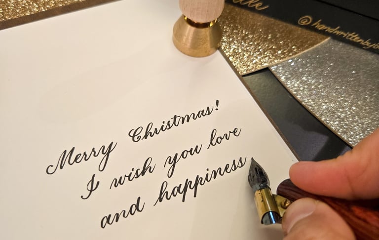 Live calligraphy on holiday card by NYC calligrapher Handwritten by Belle.