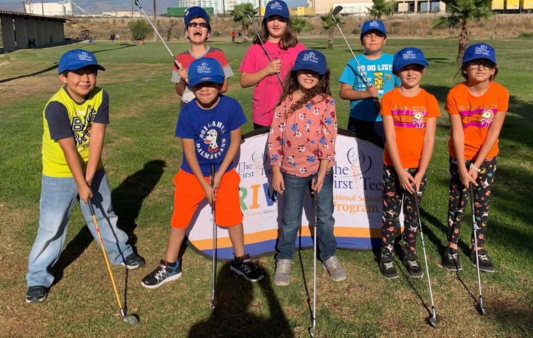Enhancing Forward Action Inc. image of a group of children golfers posing