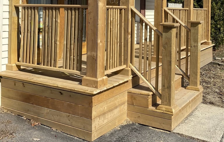 a porch with a wooden porch and a wooden porch