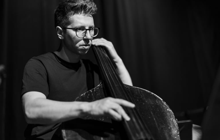 Photo by Fran Marshall. Playing in Ireland with Jess Gillam. Playing my 1860 Northern English bass