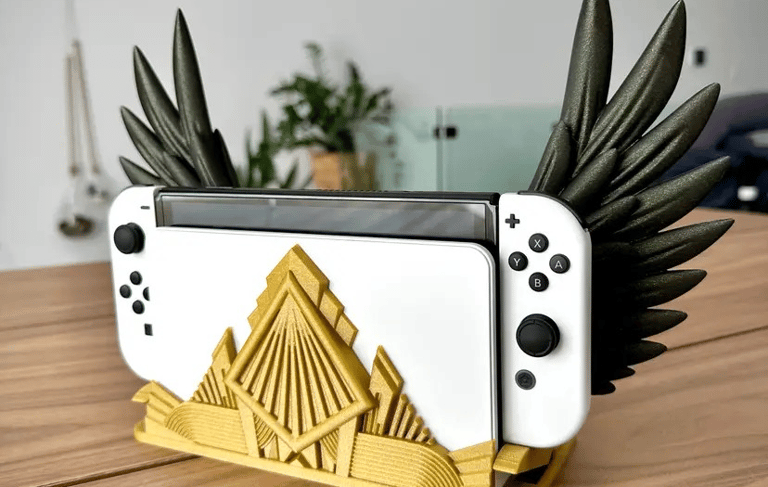 a nintendo wii game console controller with wings