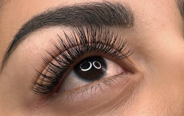 a woman with a black eyeliner and a black eyeliner