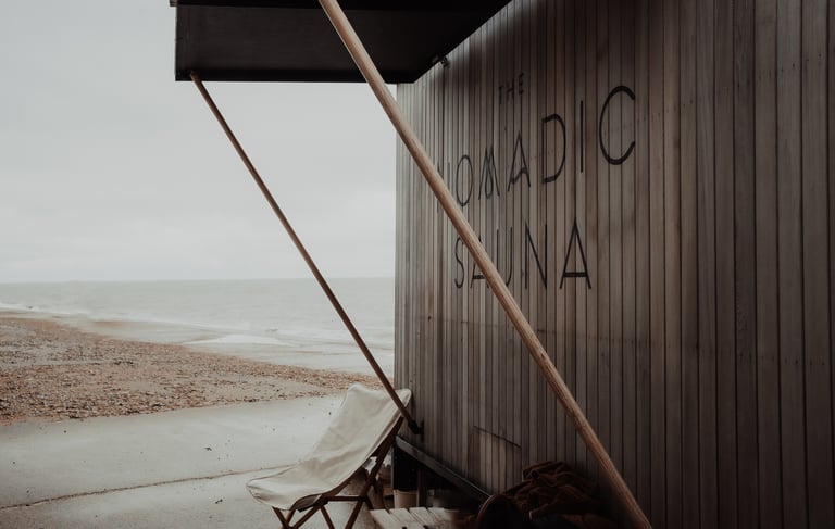 photo of wood fired nomadic sauna on the coast