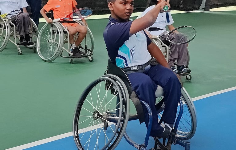 Wheelchair tennis player with Cesar Performance Coach
