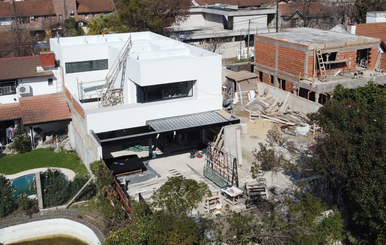 a house with a pool and a swimming pool