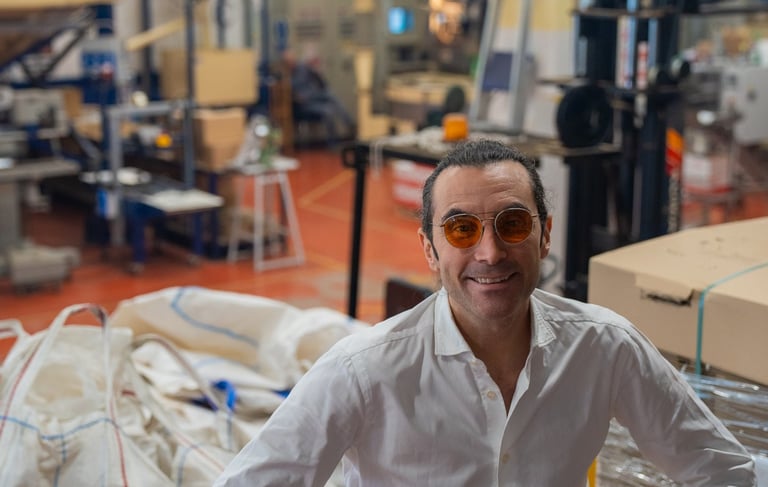 Matteo smiling in his roastery