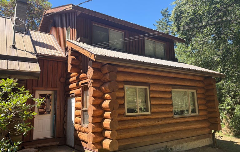 Log home in Courtenay after restoration by Embassy Restorations Vancouver Island