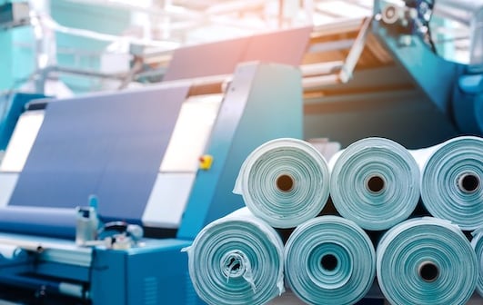 Textilmaschine und Textilrollen