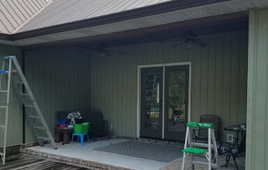 a house with a ladder and ladders