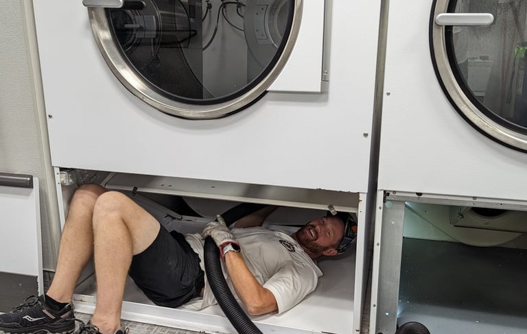 Cleaning a commercial dryer