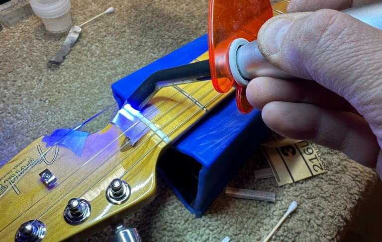 guitar nut repair using UV fillings