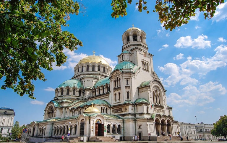 The Alexander Nevsky Cathedral in Sofia, Bulgaria, featuring gold domes and Neo-Byzantine architecture.