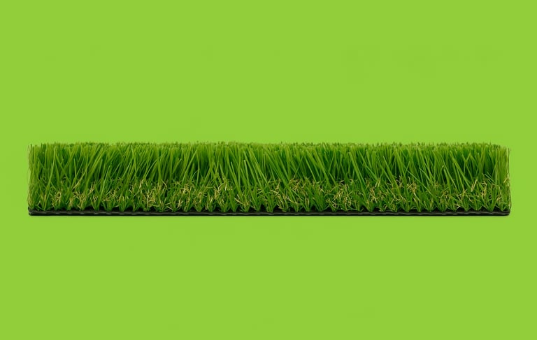 a green grass field with a green background