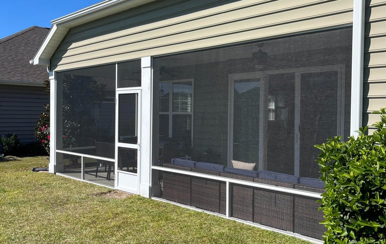 Back porch with Aluminum system screened in porch enclosure.