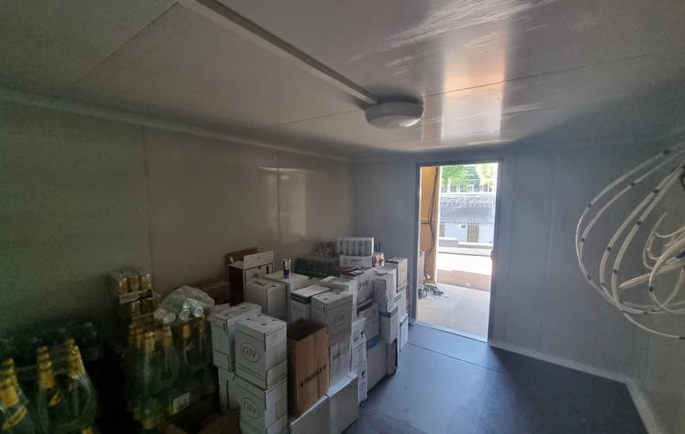 Beer room with wall mounted cooling unit