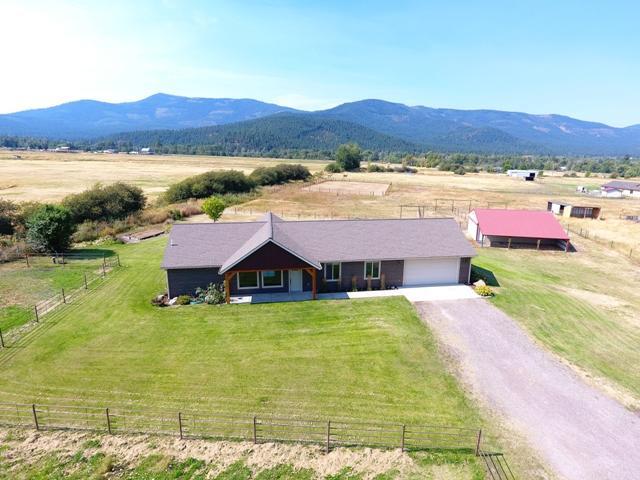 Custom luxury home built in Arlee, MT with the Mission Mountains in the background