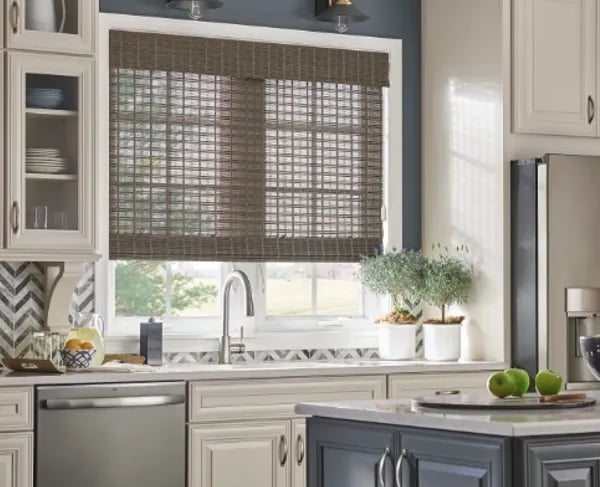 kitchen with woven wood shades above sink and modern cabinetry – Rise Up Window Coverings Milwaukee