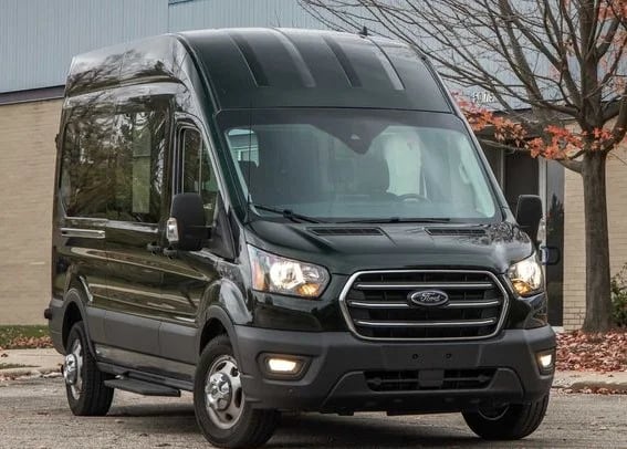 a black van parked in front of a building