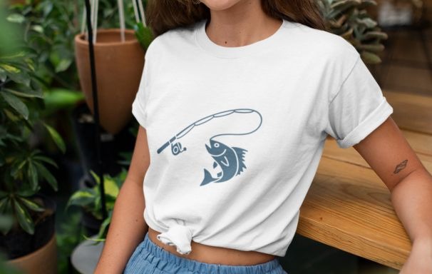 Girl wearing white T-shirt with minimalist spinning fish vector design by Wyrlight.