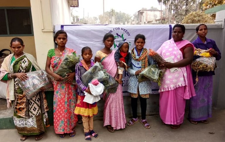 a group of women standing and holding things