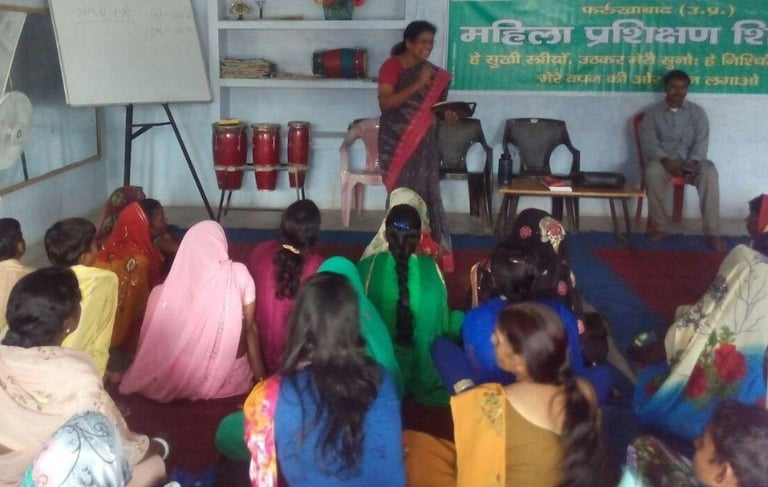 a group of people sitting in a room