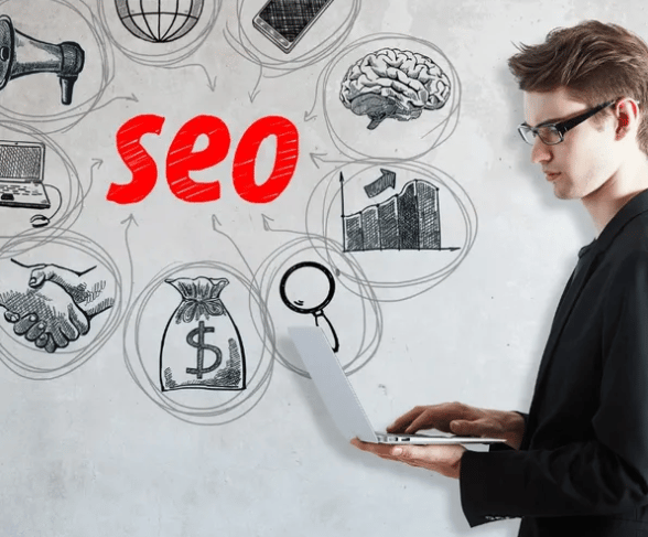 man with computer doing SEO in Calgary