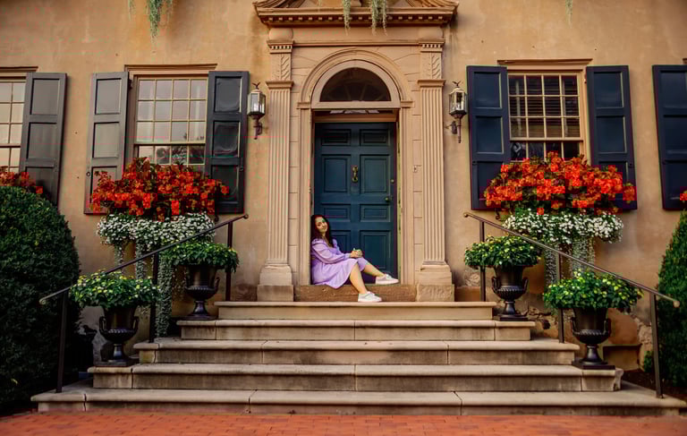 Senior Pictures of a girl in a purple dress by a Senior Picture Photographer in Lancaster PA