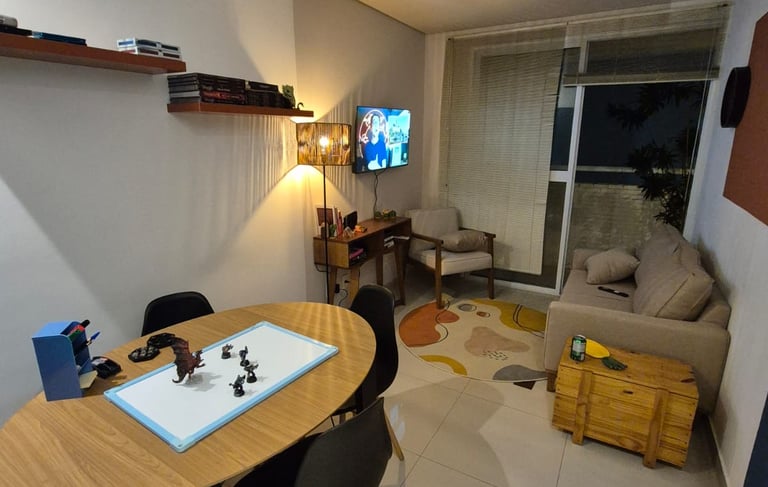 a dining room with a table and chairs