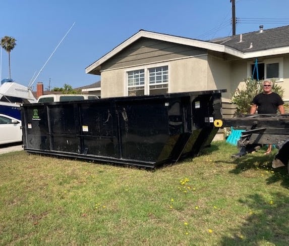 Our 18 cubic yard dumpster is ready for house junk cleanup