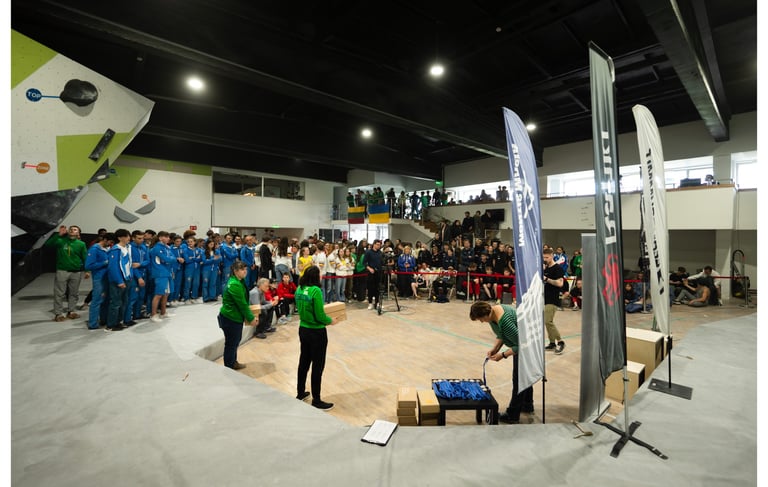 a group of people standing around a stage